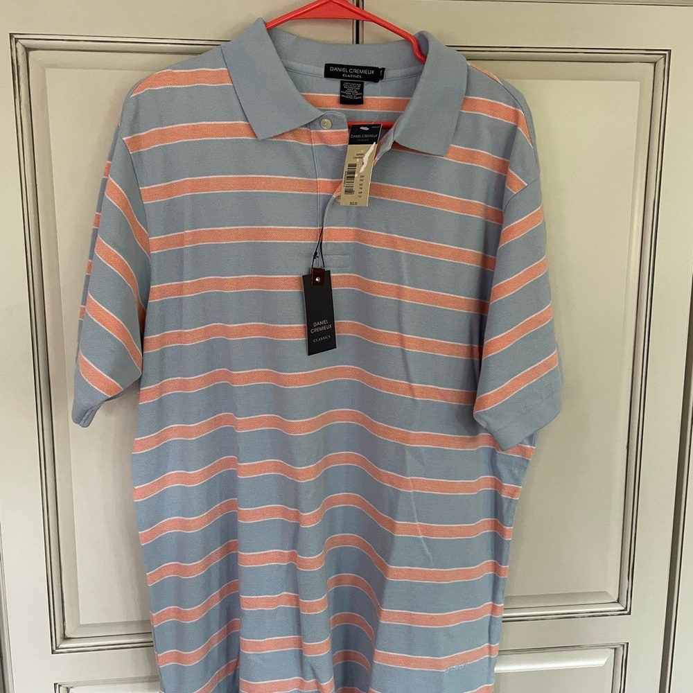 New with tags polo.  Size large